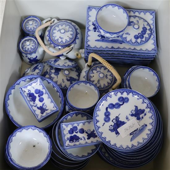 A large quantity of modern Chinese blue and white teaware and a stick stand